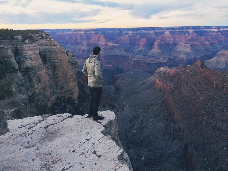 A man who listened to these lonely songs, songs about loneliness, and songs about being lonely on a cliff alone looking over a large empty canyon.