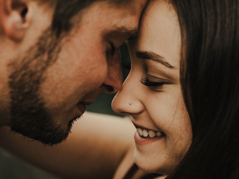 A man who figured out how to tell someone you love them about to kiss the woman he loves.