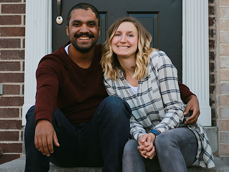 This happy couple sitting on their front porch listened to this new relationship advice that most people don't hear.