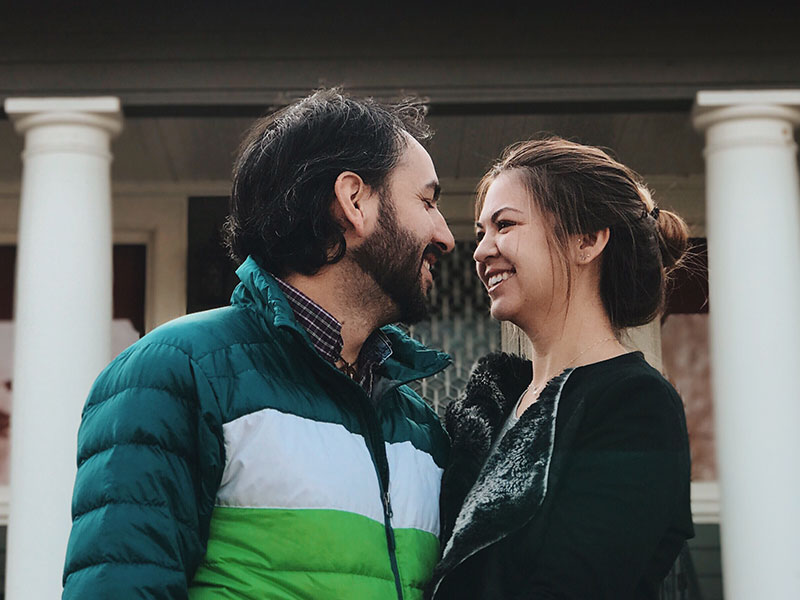 A couple who's 40 and single, smiling as they cut through the bullshit and get to know each other.