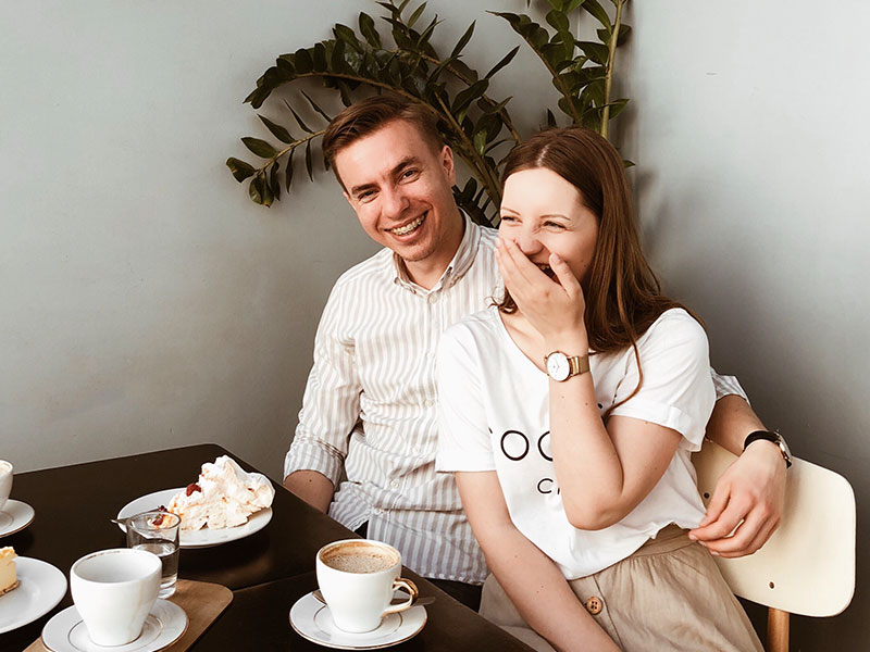 A couple who's thinking about becoming exclusive having dinner together.