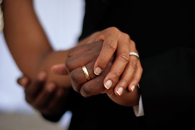 married couple holding hands after finding love on dating apps