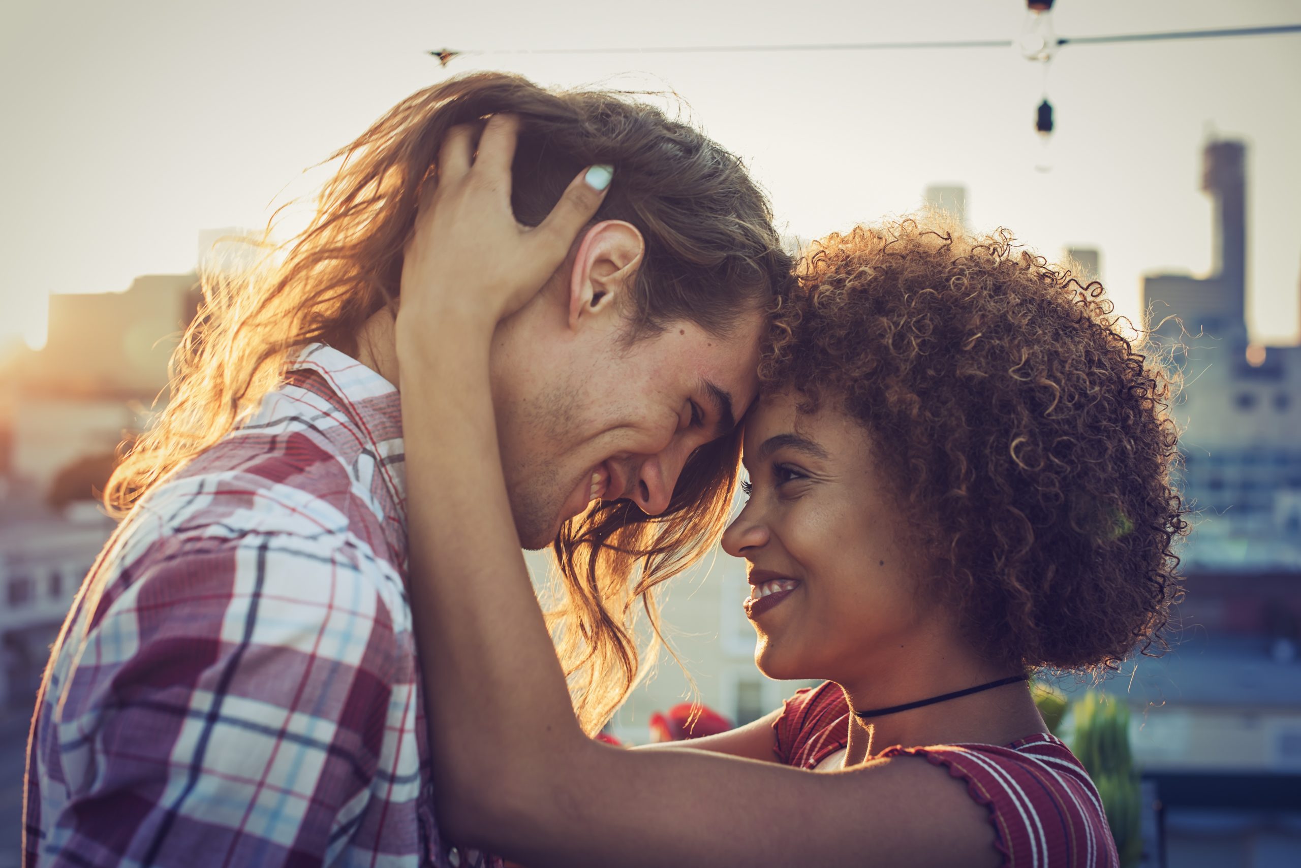 attractive young couple on a date in Atlanta on a rooftop