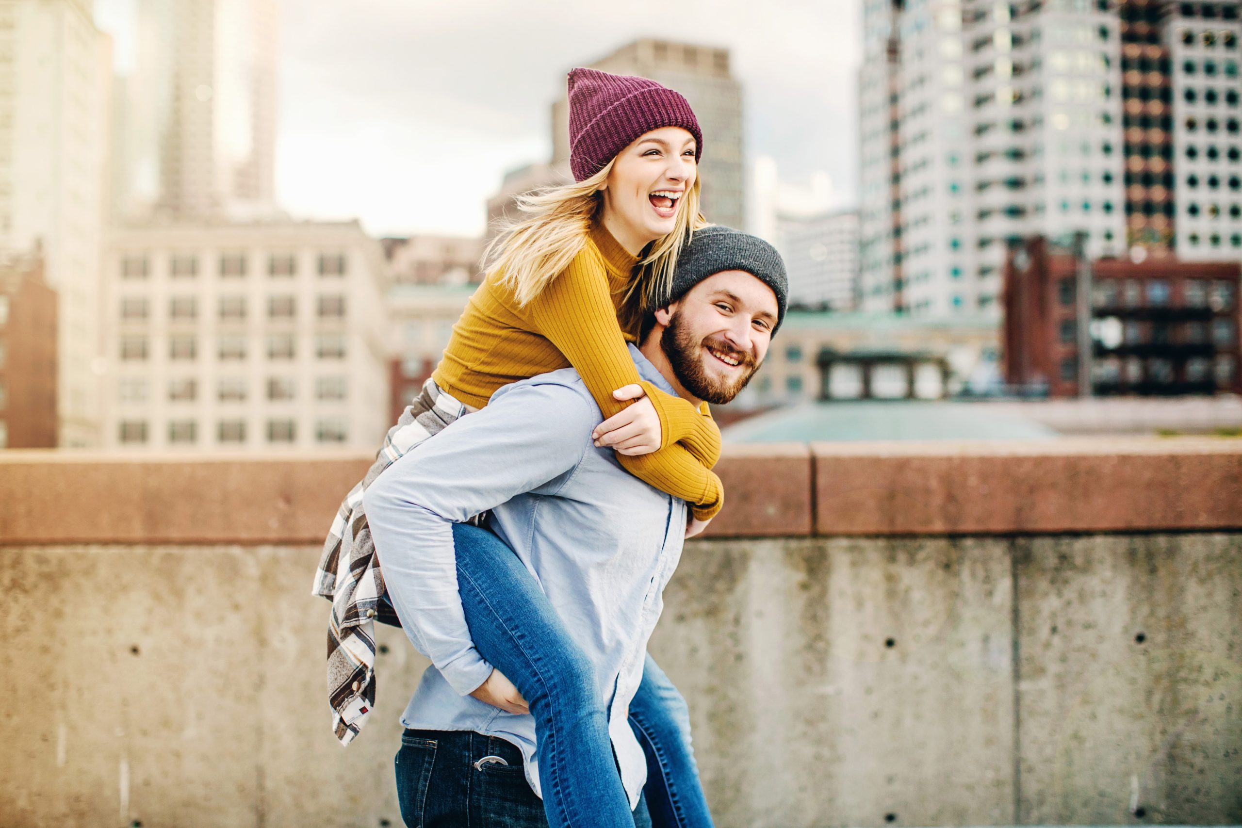 couple on a rooftop in Boston on a date